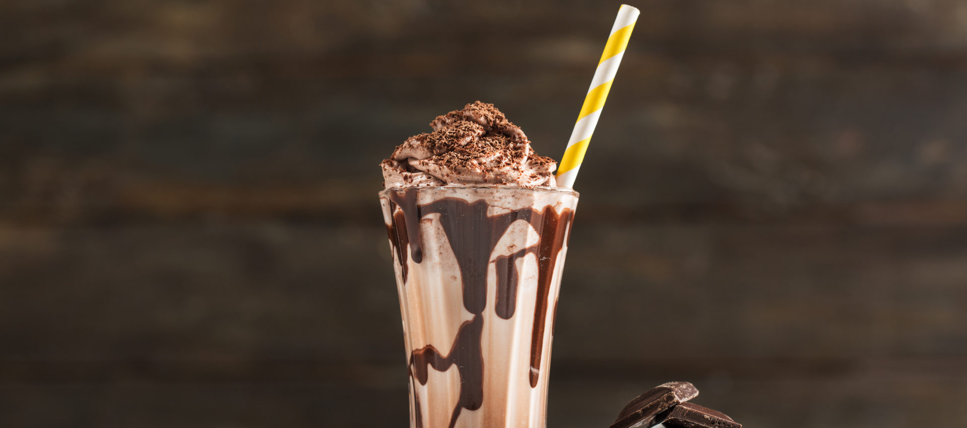 Chocolate Milk and Whipped Cream on Table